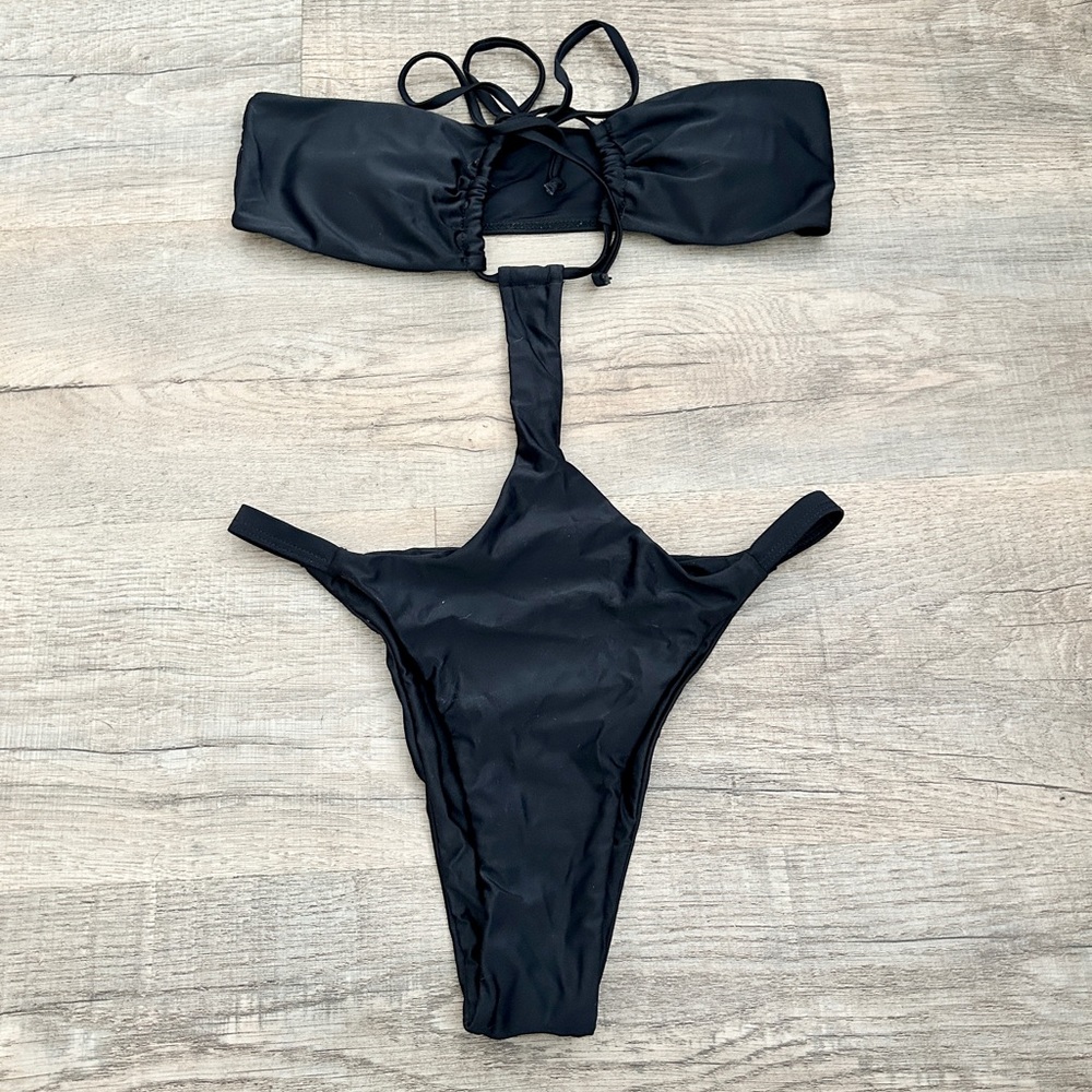 Matte Collection black cut out one piece bikini size M.
